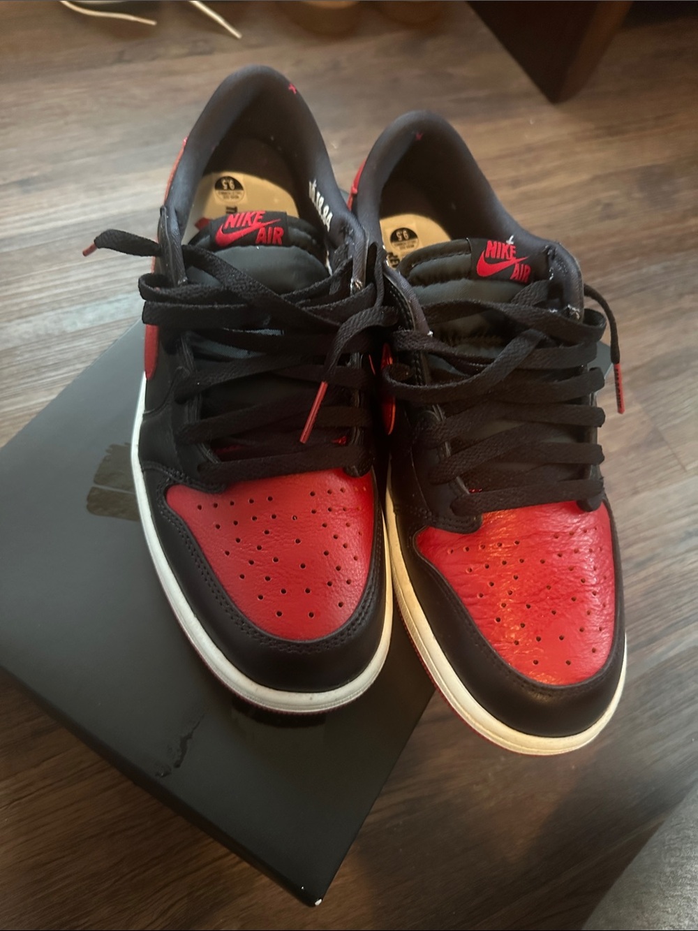 Nike Low-Top Sneakers in Black & Red Jordan low banned 1’s